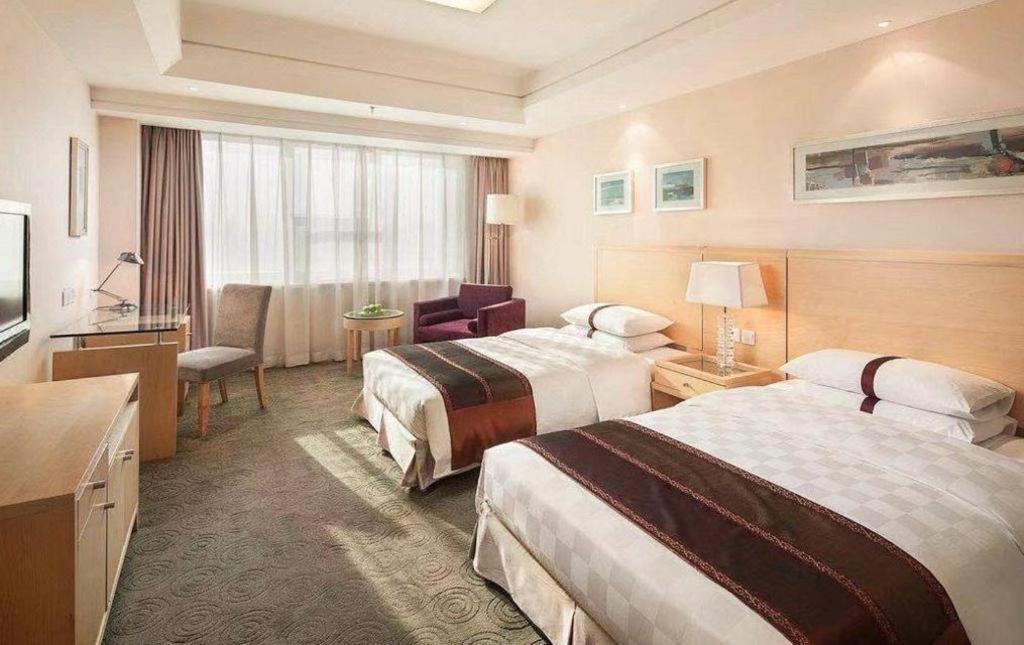 Ramada Plaza Shenyang Citycenter Esterno foto